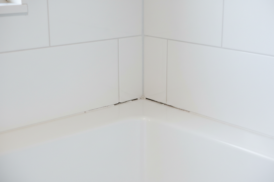 Grout Cracking in Shower Corners? The Science Behind the Failure