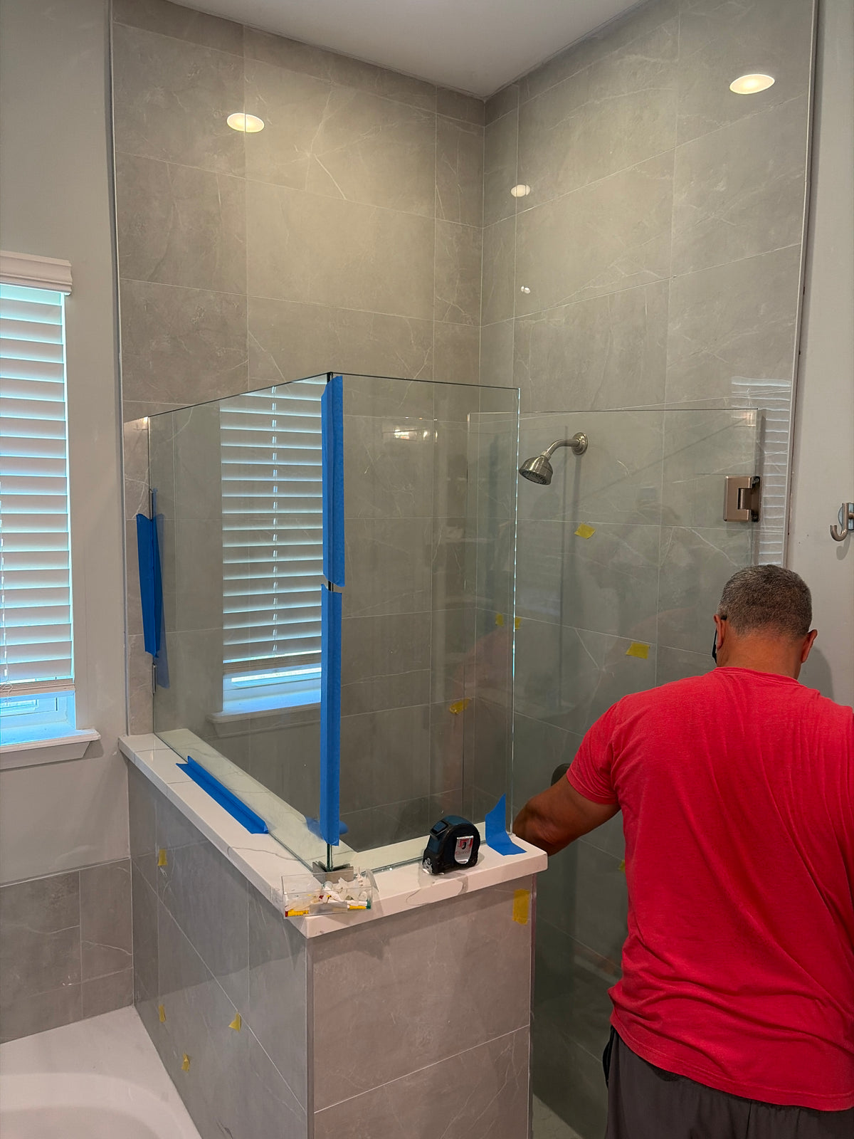Sand & Stone Tile installer setting tile on a job in Fernandina Beach, FL