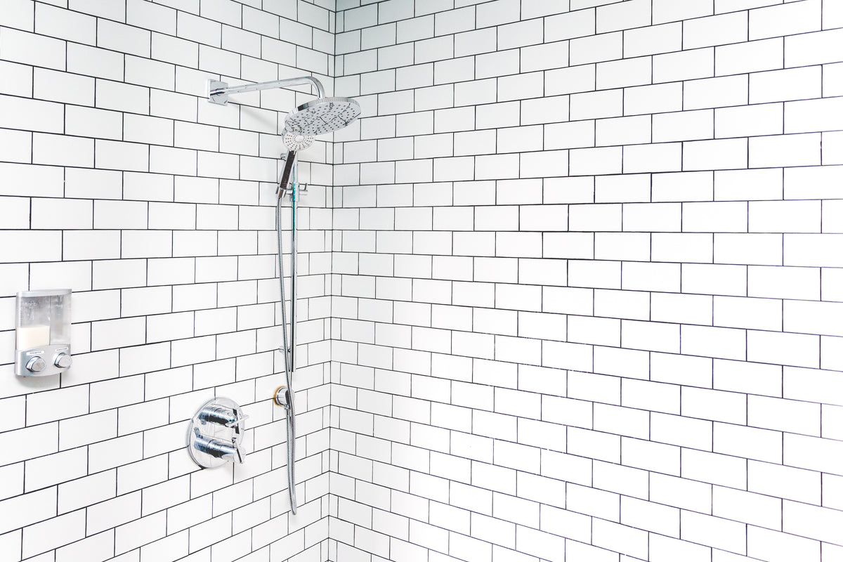 Rainfall + handheld combo — rainfall shower heads idea from Sand & Stone Tile